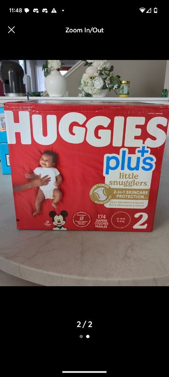 Huggies plus size 2 and Pampers size 1 baby diapers
