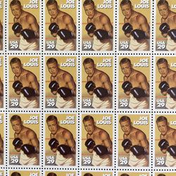 U.S. Postage Stamps Of All Time Great Heavyweight Boxing Champion Joe Louis Of The 1930s-1940s. Includes One Sheet Of 50 Stamps. Never Used. Mint. 