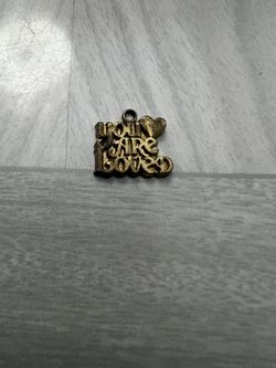 Vintage You Are Loved Charm Gold Goldtone   Vintage condition  some discoloration  will be shipped in an envelope.  Please feel free to ask questions 