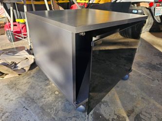Roller storage / stand with magnetic tinted door