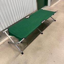 Foldable camping cot  in a bag. 6 feet long , 25” wide , 17” high $40