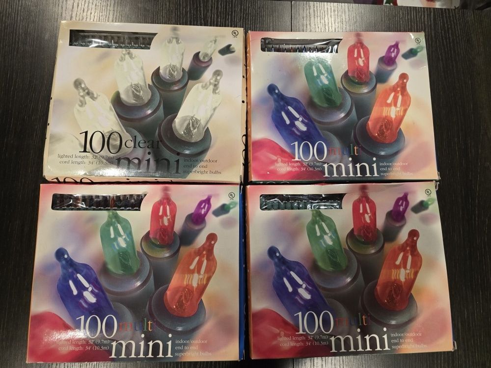 New- 4 packages 3 multi, 1 white, total 400 Christmas mini lights