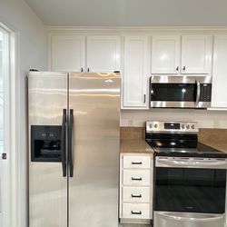 SS Frigidaire Side by Side Fridge, Electric Range, & OTR Microwave