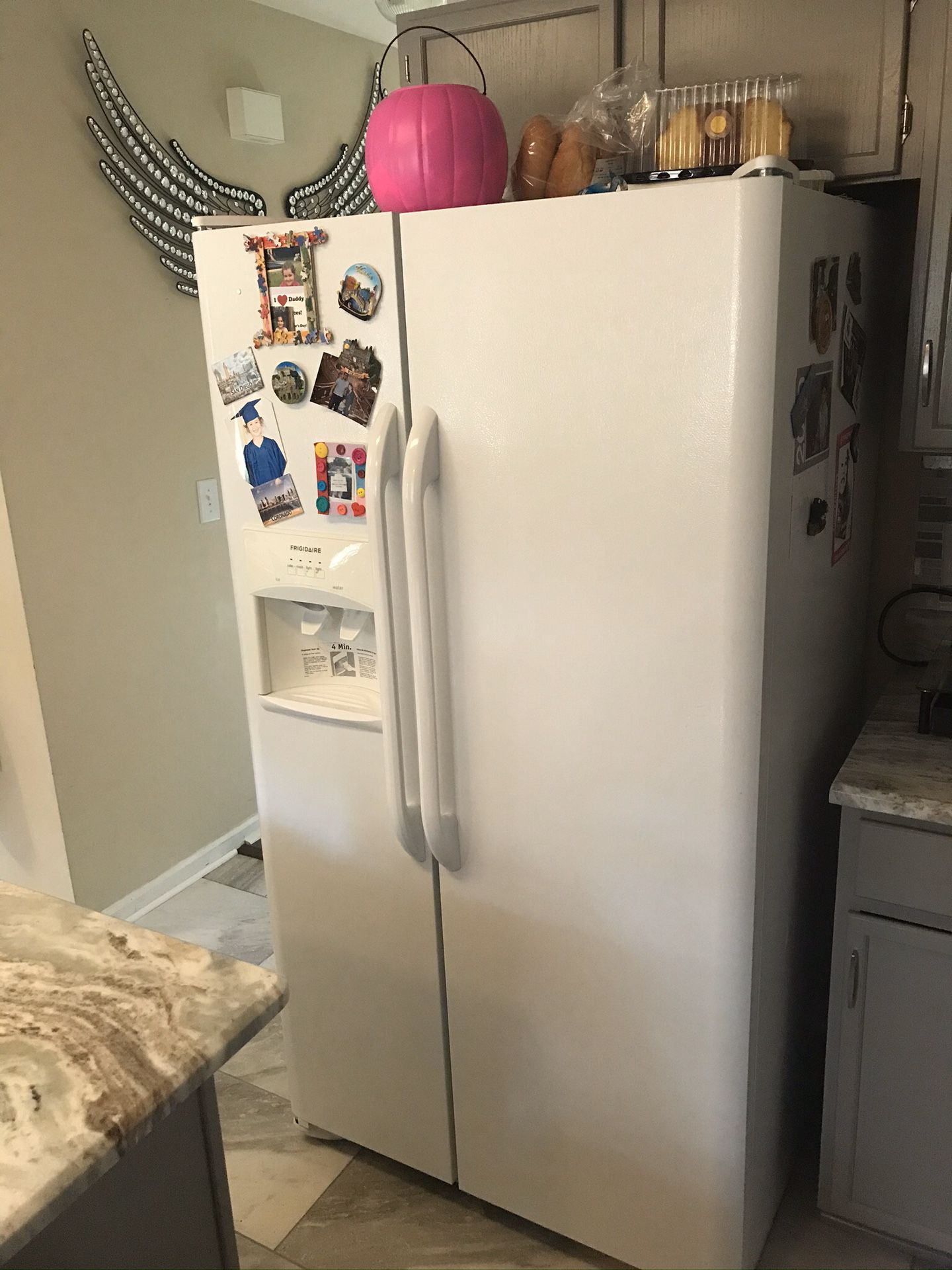 For sale is a complete set of Frigidaire refrigerator, whirlpool dishwasher, whirlpool electric oven and Frigidaire microwave