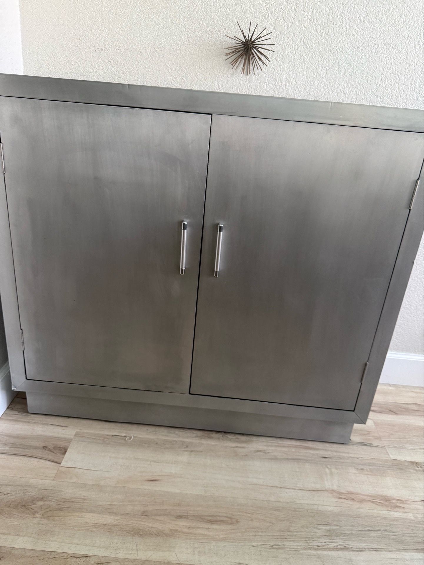 Elegant gray, 2 shelved metal Cabinet, stain resistant.