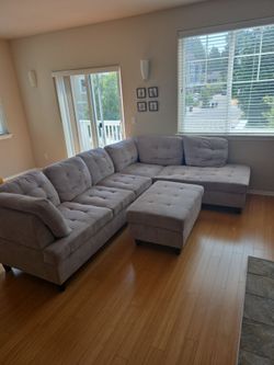 Gray Tufted Sectional Sofa with Ottoman