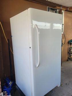 Frigidaire upright freezer with a single door