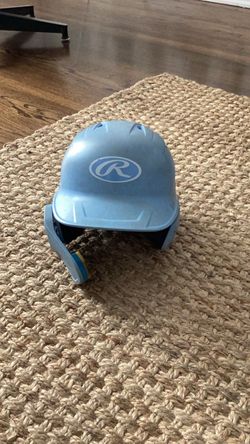 Light blue rawlings helmet