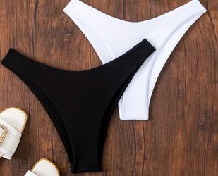 Set of 2 bikinis white and black colors size M New Never Used