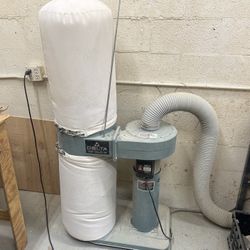 Separate shop vac one horsepower 5 inch 15 foot of hose Rech cleanable upper and lower bag 110 V ready to go