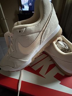 Tan and Salmon Nike