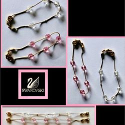 Two Swarovski pink and clear bracelets 
