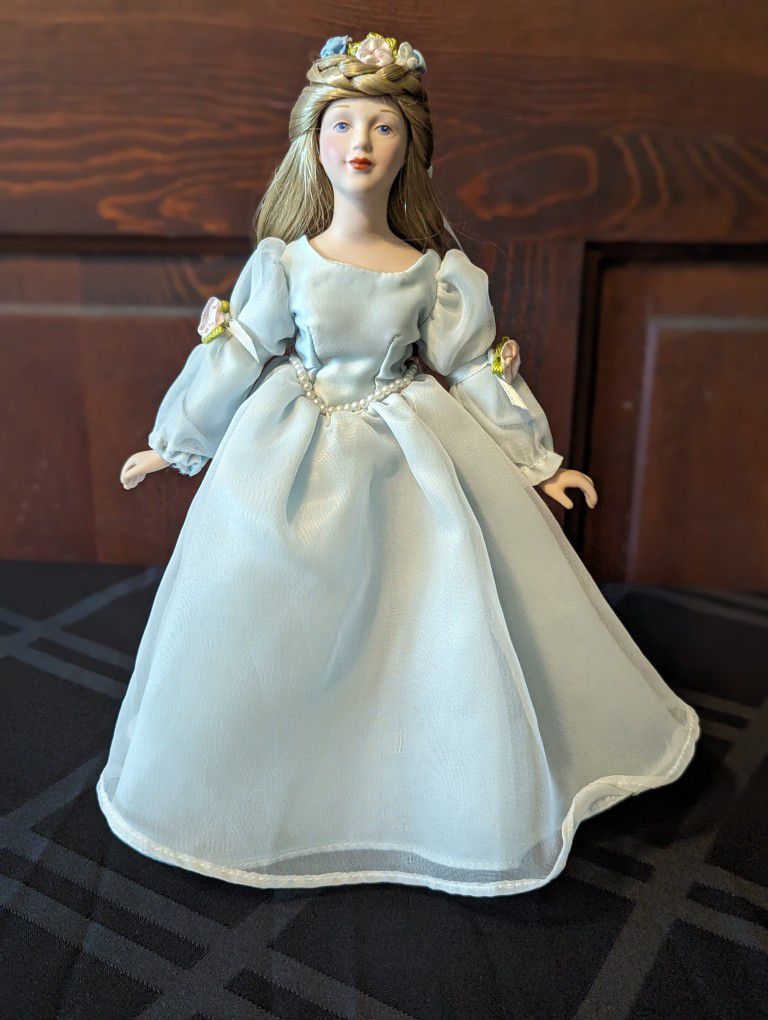Porcelain Medieval Doll with doll stand 