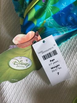 From Disney store swimming suit two piece Tinker Bell size 7 brand new
