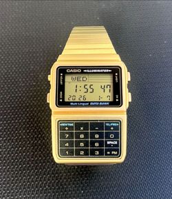 Vintage Casio DBC-611G Gold Illuminator Data Bank Calculator  w/Multi-Functions.