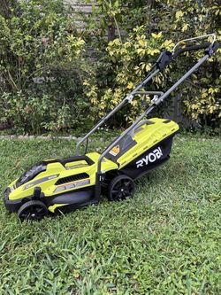 NEW RYOBI 13 " INCH 11AMP CORDED LAWNMOWER COMES IN A BOX. IT'S VERY CUTE LITTLE LAWNMOWER PERFECT FOR THE SMALL FRONT OR BACK YARD. IT DOES REQUIRE E