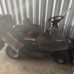 This item is a Craftsman II rear-engine riding lawn mower, featuring a 30-inch cutting deck and a 13-horsepower engine.   	•	Model Type: Rear-engine r