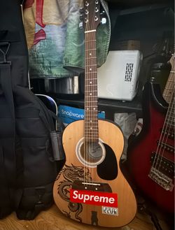 Small Acoustic Guitar With Cool Dragon Deaign