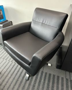 Swivel faux leather chair
