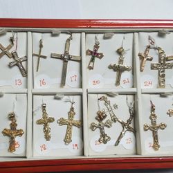 A Wide Range Of Assorted 14k Yellow and White Gold Cross