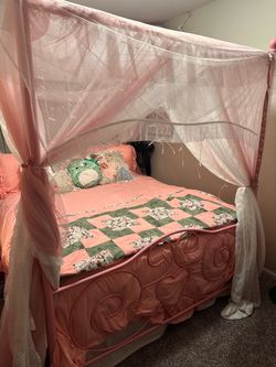 Pink queen size bed frame with metal canopy frame