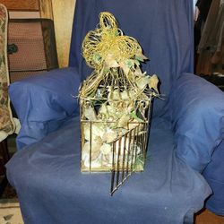 Birdcage With Magnolia Flowers