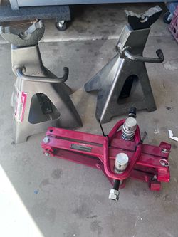 Clamshell strut spring compressor and two 6 ton jack stands