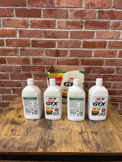 Four factory sealed unopened quarts of  Castrol GTX SAE 5W-30 motor oil  ✨ is specifically engineered to provide superior protection against engine sl