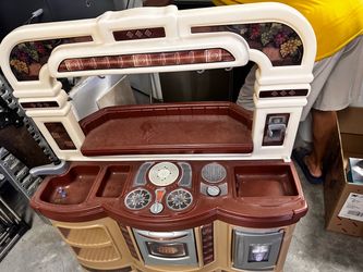 Vintage full-size plastic children’s play kitchen