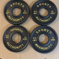 Four 2.5lb Olympic Plates 