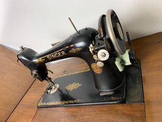 Antique stinger sewing machine with table
