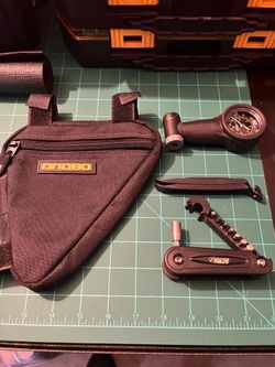 Bicycle mini tool & tire gauge