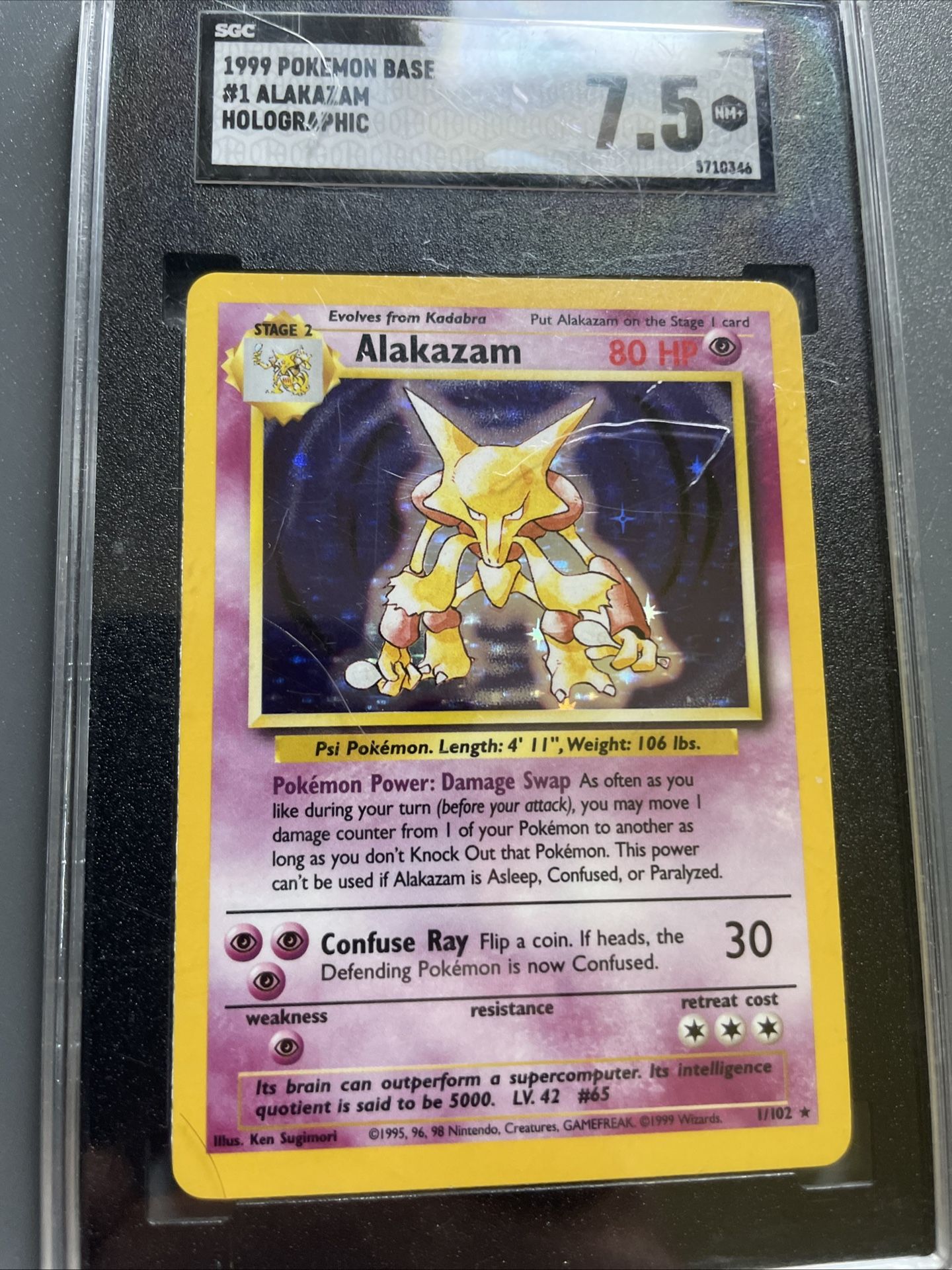 Alakazam Base Set Graded Pokémon Card. CGC 7.5