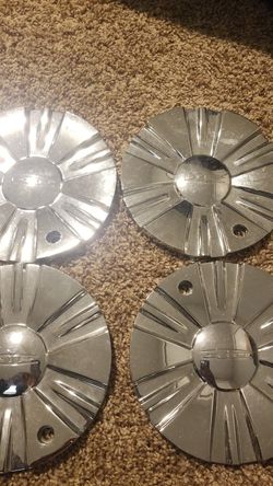 4 center caps 10 a piece