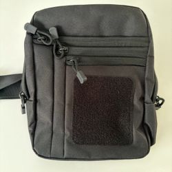 Concealed Carry Sling Bag. One hand operated.