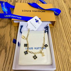 Louis Vuitton Gold Bracelet w/ Black Emblems