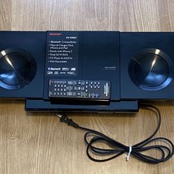 Sharp DK-KP85P Slim Micro System features a top-mounted dock for Apple Lightning devices The system also supports Bluetooth technology for wireless