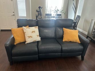 Power reclining leather couch