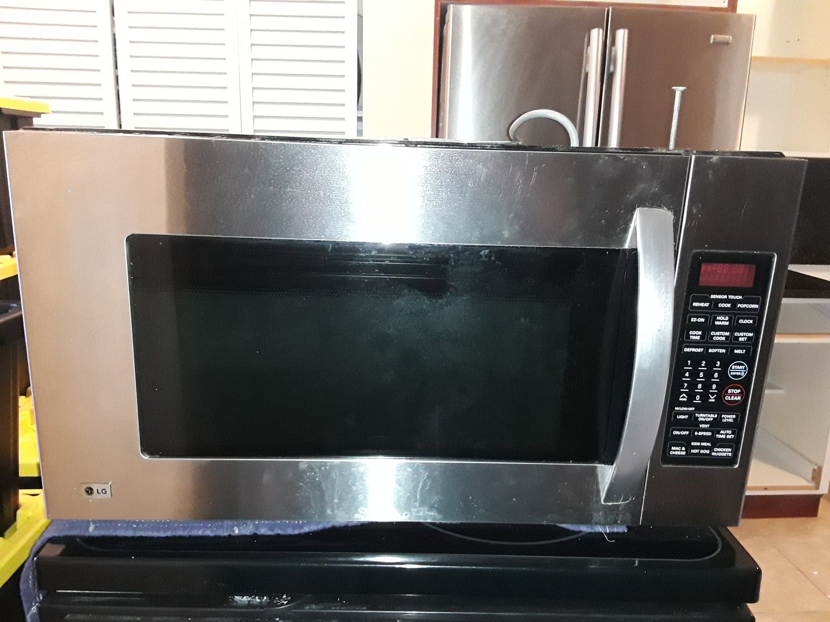 FREE! LG Over Range Microwave Oven