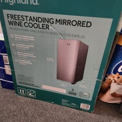 Highland Freestanding Mirrored Indoor Wine Cooler.
