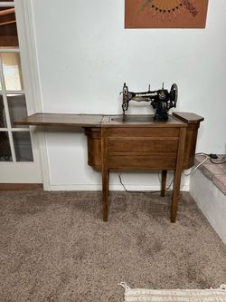 Antique White Rotary Sewing Machine with Vintage Wooden Cabinet Table