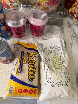 Assorted Pantry - Kirkland Chicken, Sarita Rice, Papa's Grits, and Bubble Tea Kits - can food