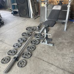 Weight Bench And Weights And Bar 7 Ft 