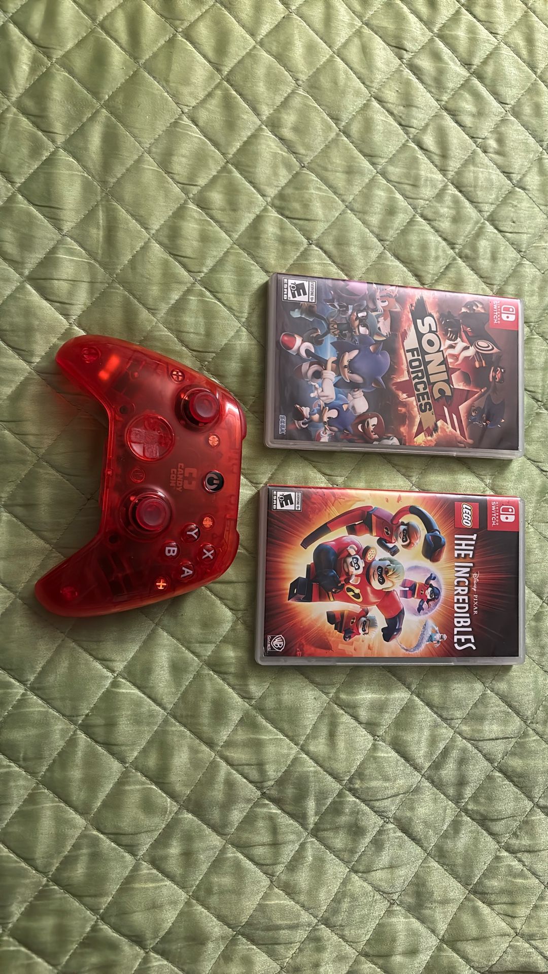 Red Nintendo Switch Wireless Controller With Two Games