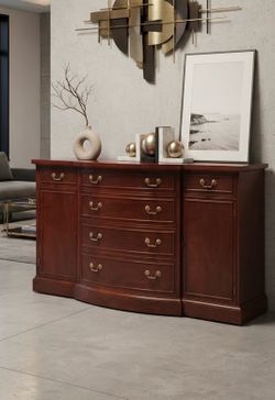 VintageBeautifutraditional cherry wood buffet/credenza in excellent condition. This versatile piece features a serpentine front with four central draw