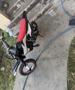 RIXOC DK-12 Moto Eléctrica de Tierra, 3 Modos de Velocidad hasta 15.5 mph, 36V 5.2A Pico 700W Máx 14