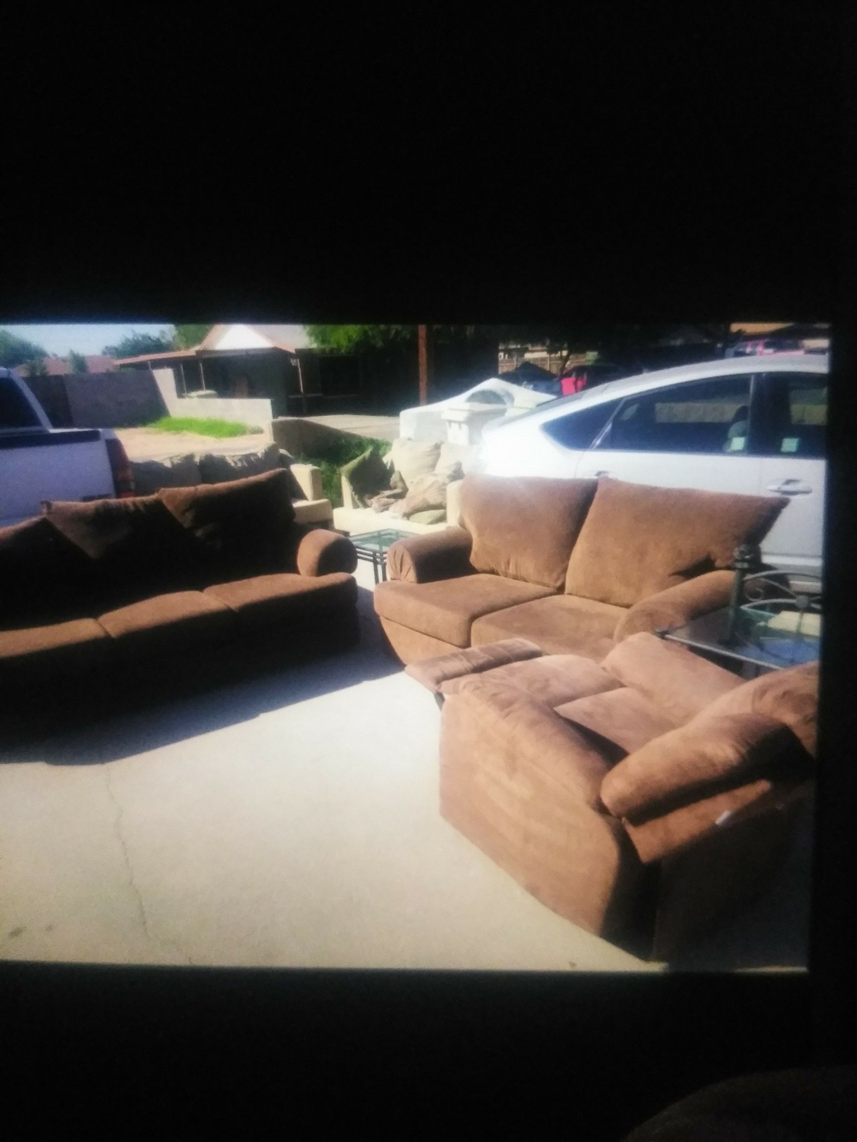 Brown Couch and loveseat with recliner chair and two glass end tables