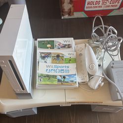 Vintage Wii console, games, remote, Wii Fit  board and risers and joysticks