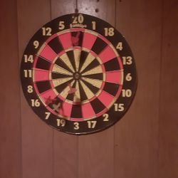Dart Board With Darts