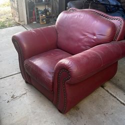 Red leather loveseat and couch